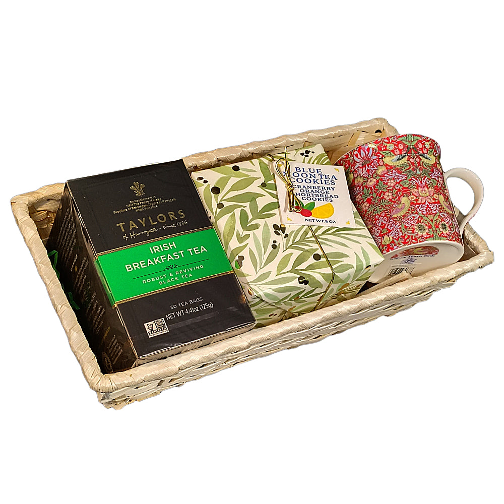 Tea set with 'Taylor's Irish Breakfast Tea' and a mug in a basket 
